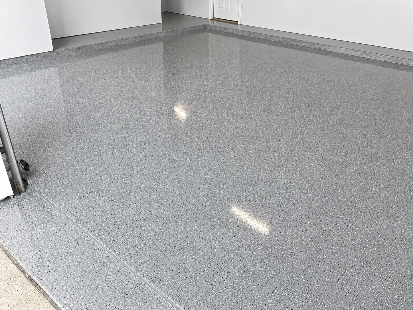 Chipped epoxy garage floor, Austin TX