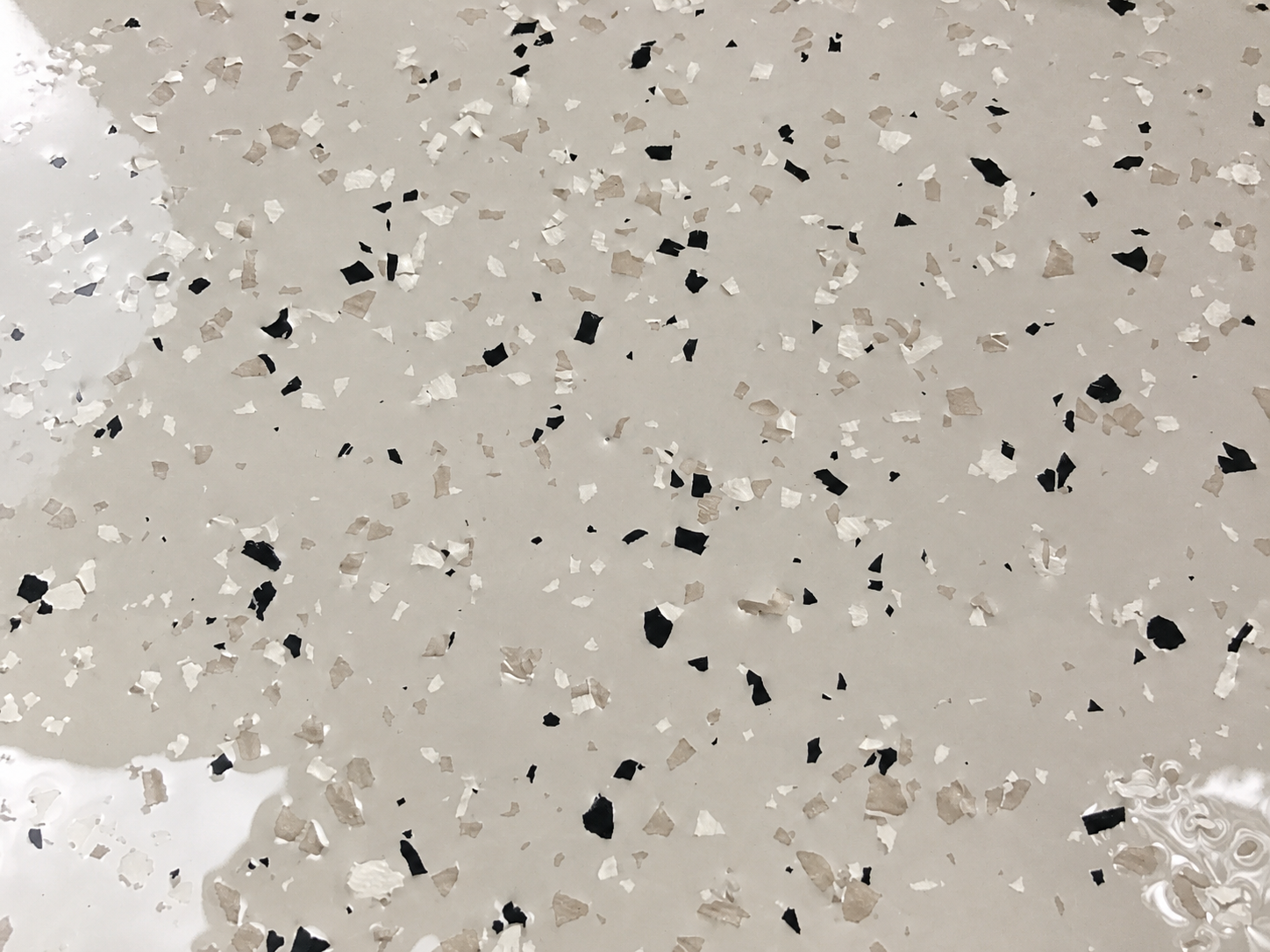 Chipped epoxy garage floor, Austin TX