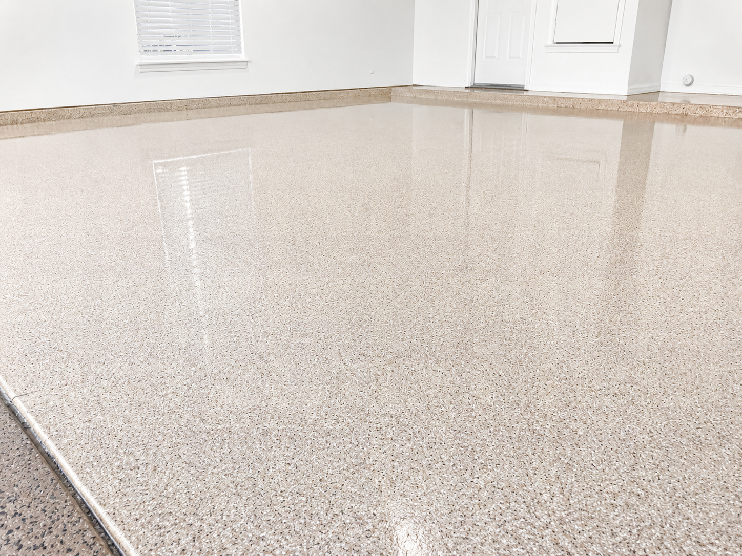 Chipped epoxy garage floor, Austin TX